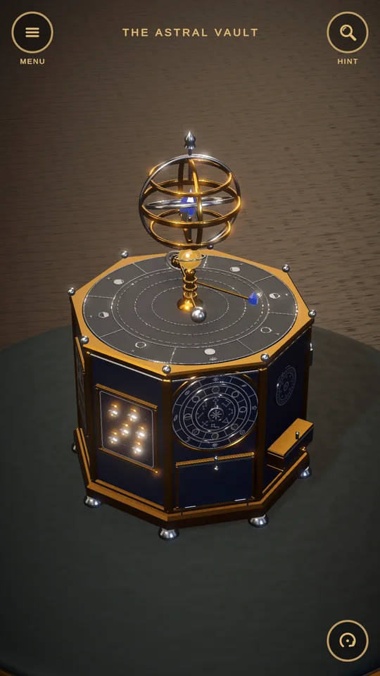 An octagonal puzzle box topped by a brass armillary sphere.